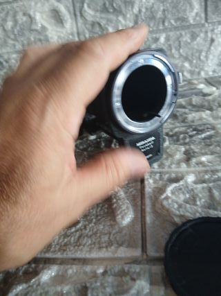 Obiettivo fotocamera nero con tre anelli...