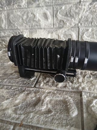 Obiettivo fotocamera nero con tre anelli...