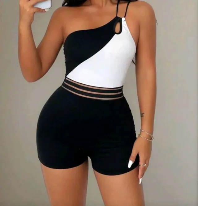 Mono de tirantes cruzados blanco y negro