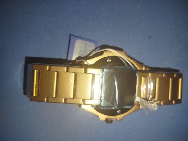 Reloj Skyline Dorado y Blanco