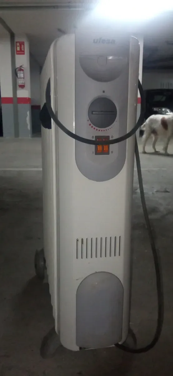 Estufa Ufesa con bombona y radiadores