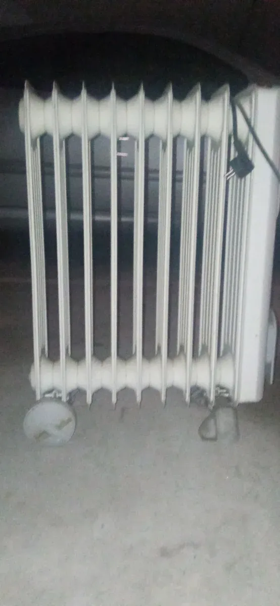 Estufa Ufesa con bombona y radiadores