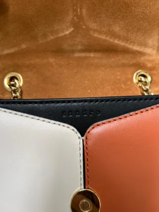 Bolso Sandro negro y naranja