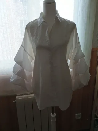 Blusa blanca manga abullonada