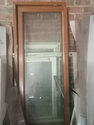 Ventana PVC Roble Dorado Rehau