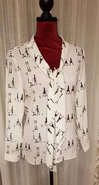 Blusa blanca estampado señoritas