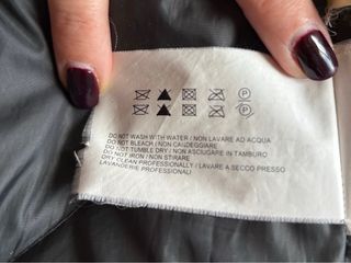 Parka Woolrich nera con cappuccio