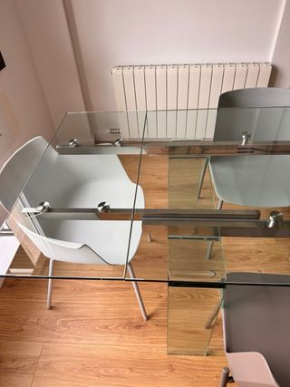 Mesa de comedor cristal y acero inox pulido
