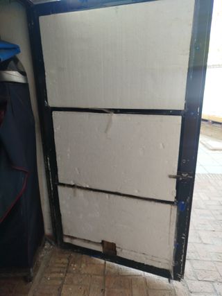 Puerta de garaje hierro forrada madera