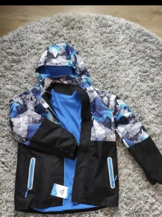 Chaqueta  montaña azul y negra talla 12 hasta 14