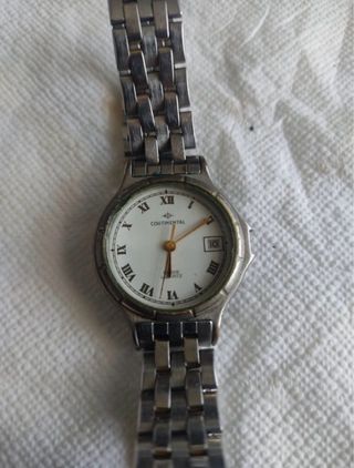 Reloj Continental piezas dorado y plateado