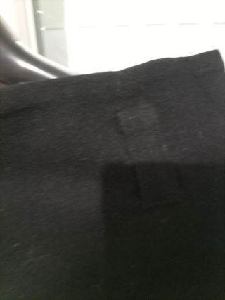 Falda negra de paño con buen corte