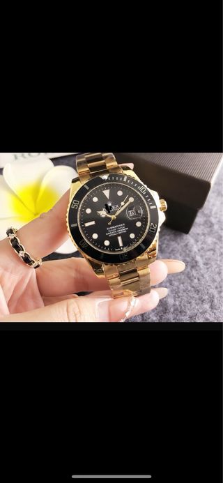 Reloj Negro y Dorado