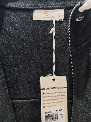 Chaqueta negra mujer con ribete blanco
