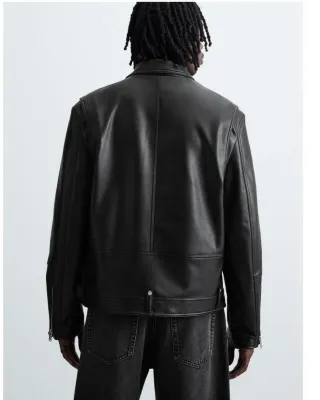 Cazadora efecto piel negra