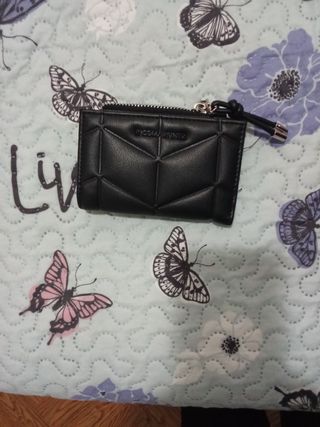 Monedero negro con cremallera