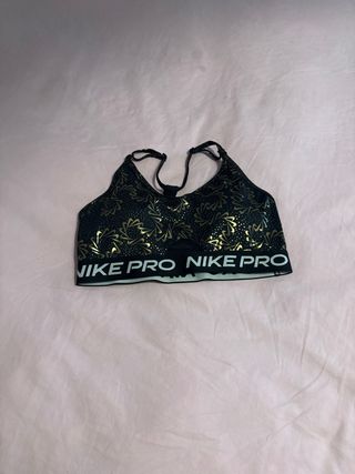 Top deportivo Nike Pro estampado dorado