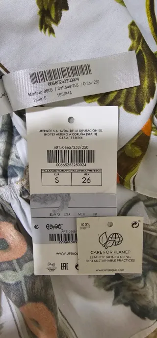 Blusa Uterqüe floral manga abullonada