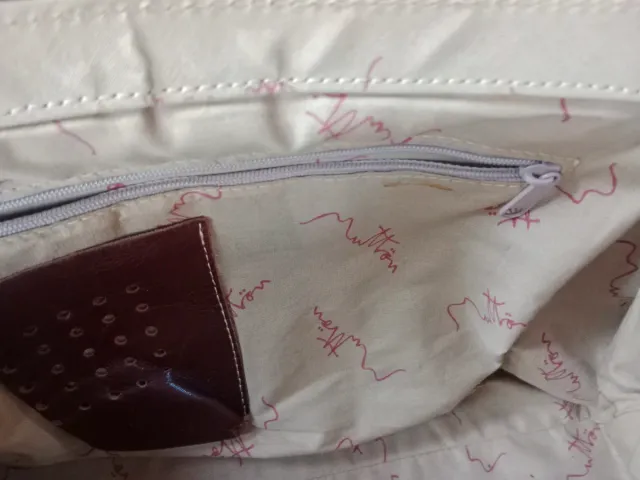 Bolso de piel beige y marrón