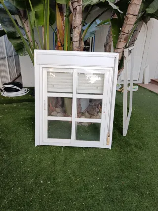 Ventana aluminio con persiana y  premarco y rejas
