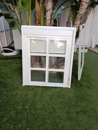 Ventana aluminio con persiana y  premarco y rejas