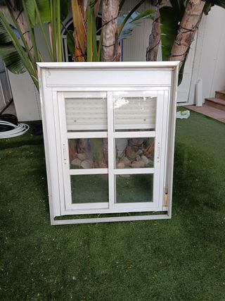 Ventana aluminio con persiana y  premarco y rejas