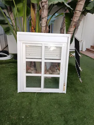 Ventana corredera aluminio con persianay rejas 