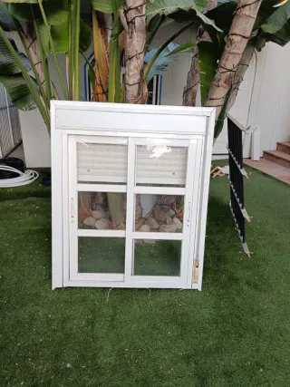 Ventana corredera aluminio con persianay rejas 