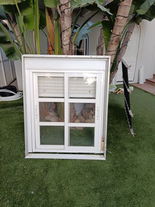 Ventana corredera aluminio con persianay rejas 