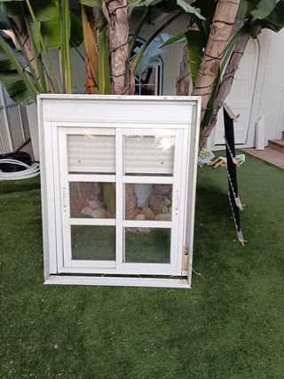 Ventana corredera aluminio con persianay rejas 