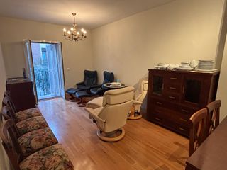 Sillón Stressless Consul cuero y madera + Reposapi