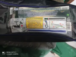 2 cañas de pesca con carretes y pichón