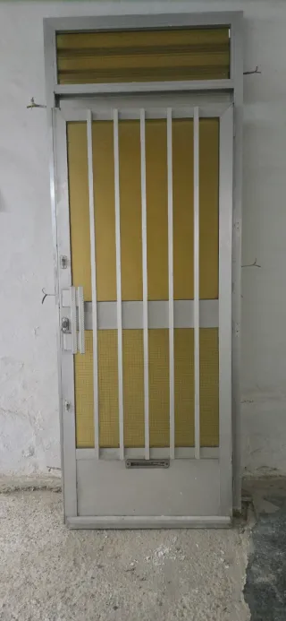 Puerta aluminio entrada con cristal