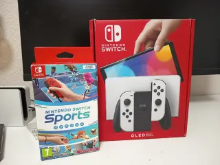 Nintendo Switch OLED + gioco + custodia + biglietto