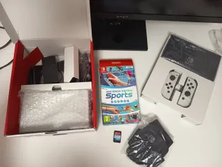 Nintendo Switch OLED + gioco + custodia + biglietto