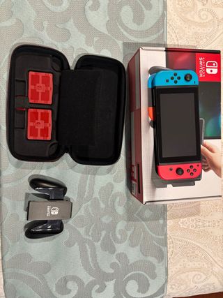Nintendo Switch + funda + mando