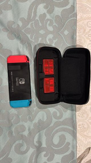 Nintendo Switch + funda + mando