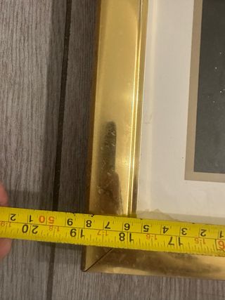 Marco metálico dorado