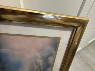 Marco metálico dorado