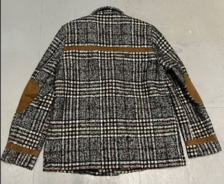 Chaqueta cuadros flecos antelina remaches