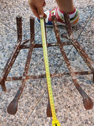 Brucia legna angolare in metallo