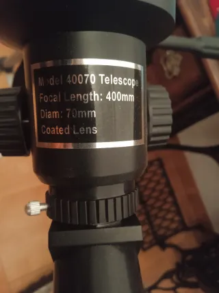 Telescopio con trípode y nivel