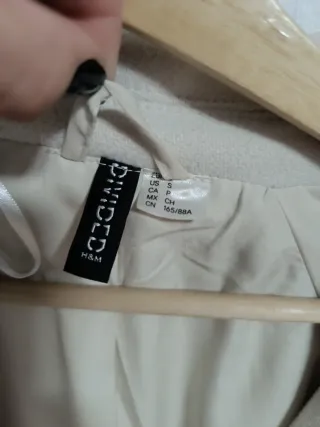 Parka fieltro  beige
Nueva vale 59.99 
H&M

