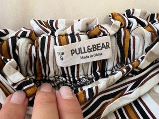 Shorts de rayas con cinturón
