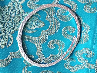 Pulsera de plata serpiente con ojos verdes