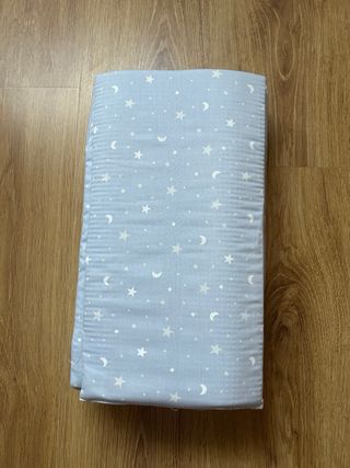 Almohadilla de bolillos azul con estrellas