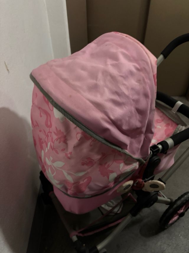 Carrito de muñecas rosa