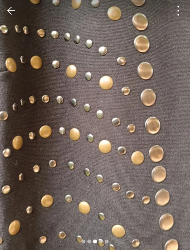 Vestido negro punto roma con tachuelas