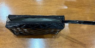 Elegante borsetta a mano lucida trapuntata