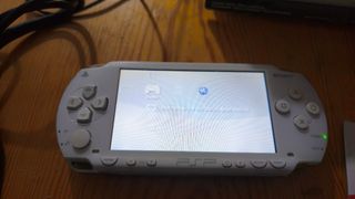PSP 1004 Blanca con Caja y Demo Disc